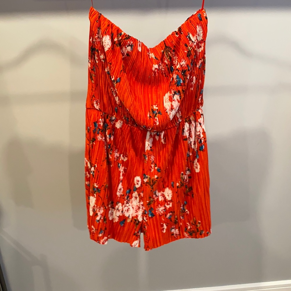 Strapless red, floral, pleated shorts romper